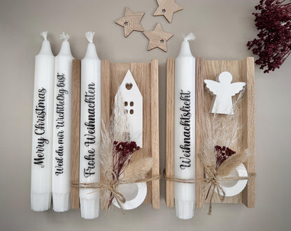 Auswahl weihnachtlicher Spruchkerzen mit Haus, Herz und Engel